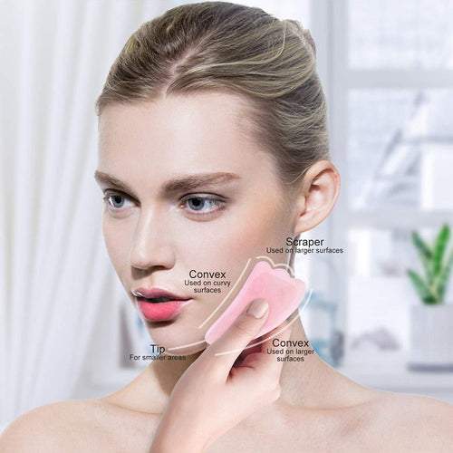 Rouleau de quartz rose pour massage facial
